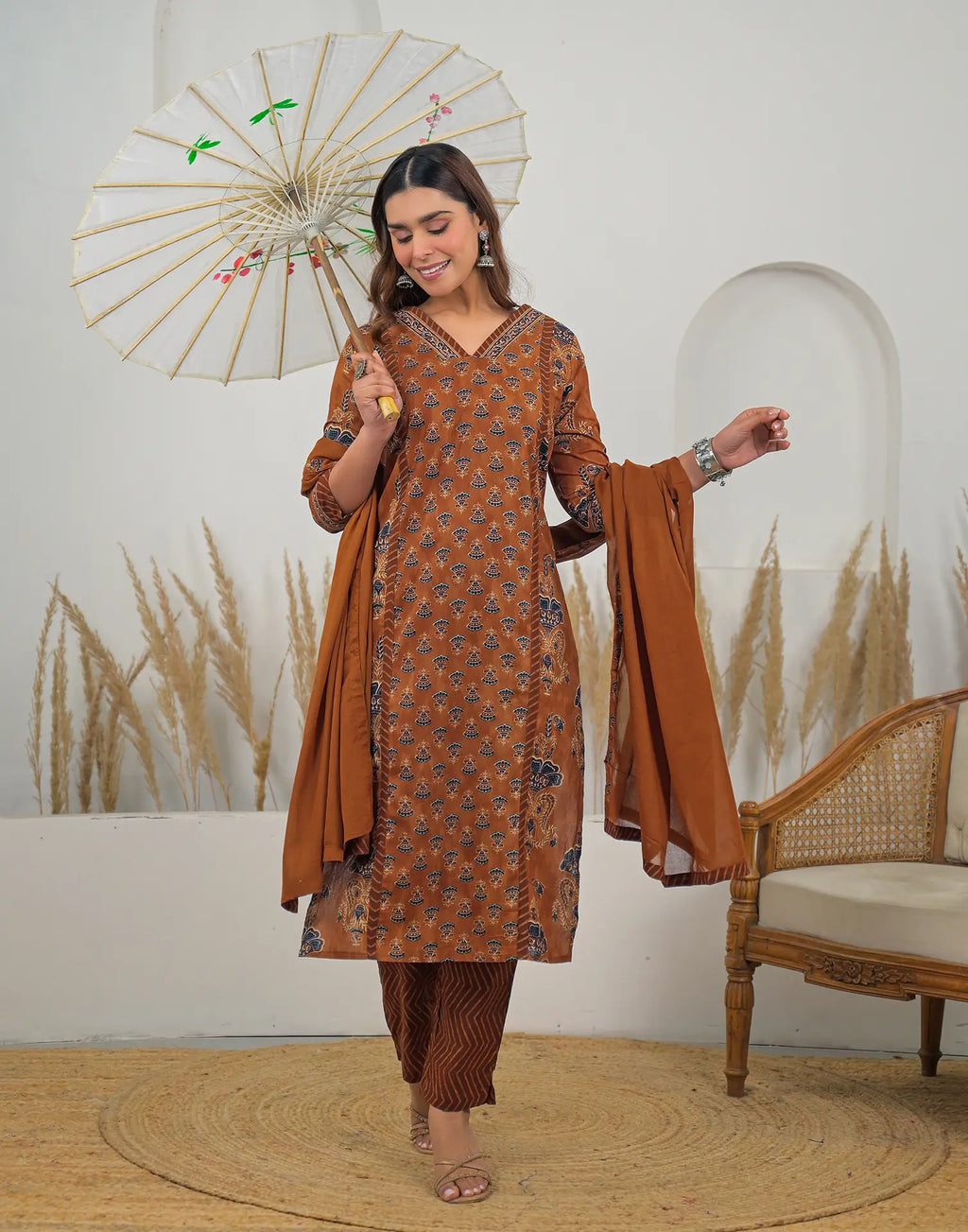 Skylee Cotton Printed Straight 3 Piece Kurta Set For Woman