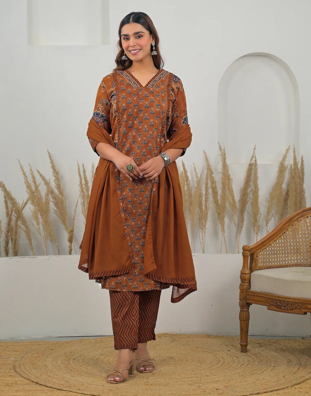 Skylee Cotton Printed Straight 3 Piece Kurta Set For Woman