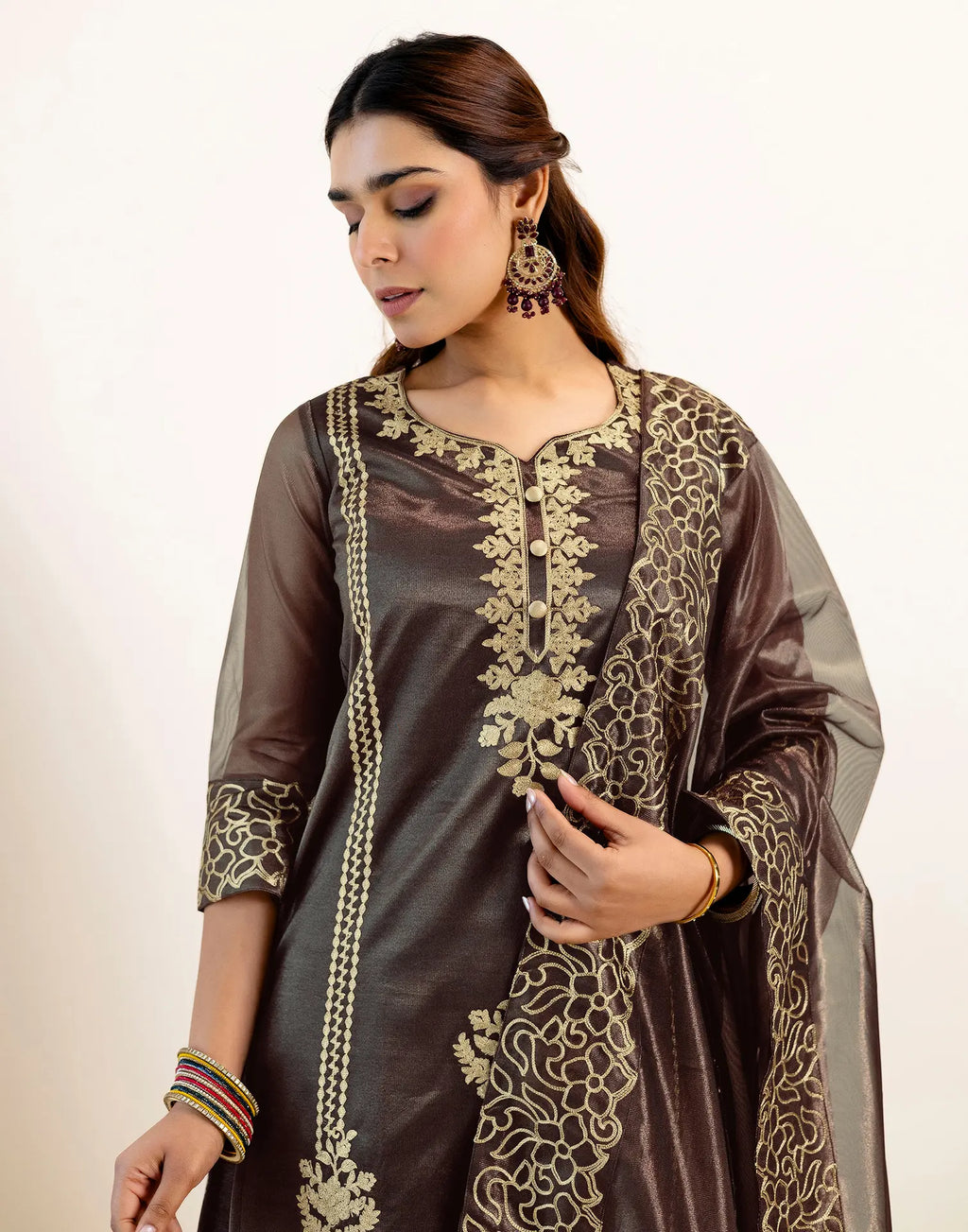Skylee Net Embroidered Straight 3 Piece Kurta Set For Woman