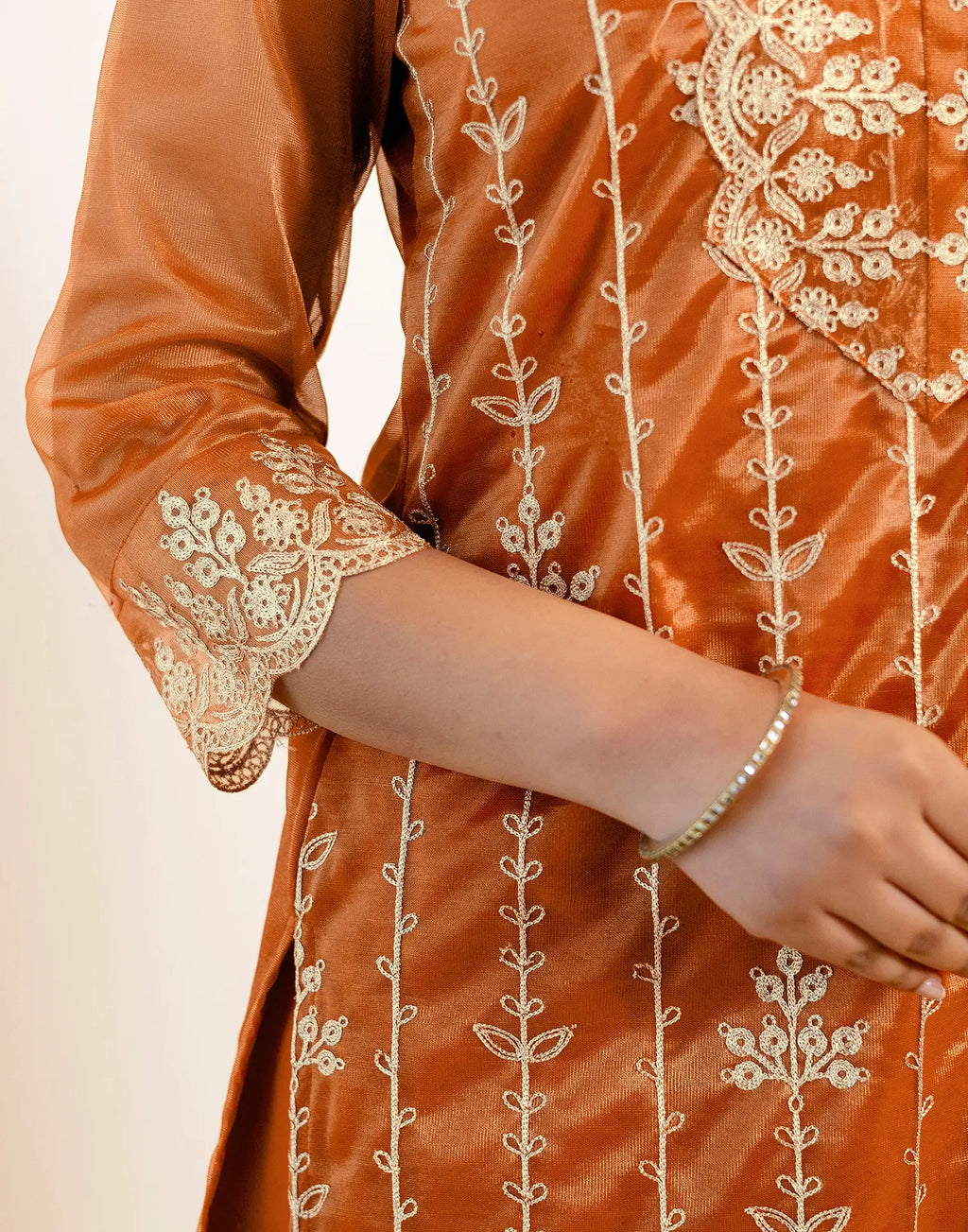 Skylee Net Embroidered Straight 3 Piece Kurta Set For Woman