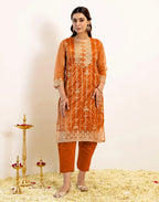 Skylee Net Embroidered Straight 3 Piece Kurta Set For Woman