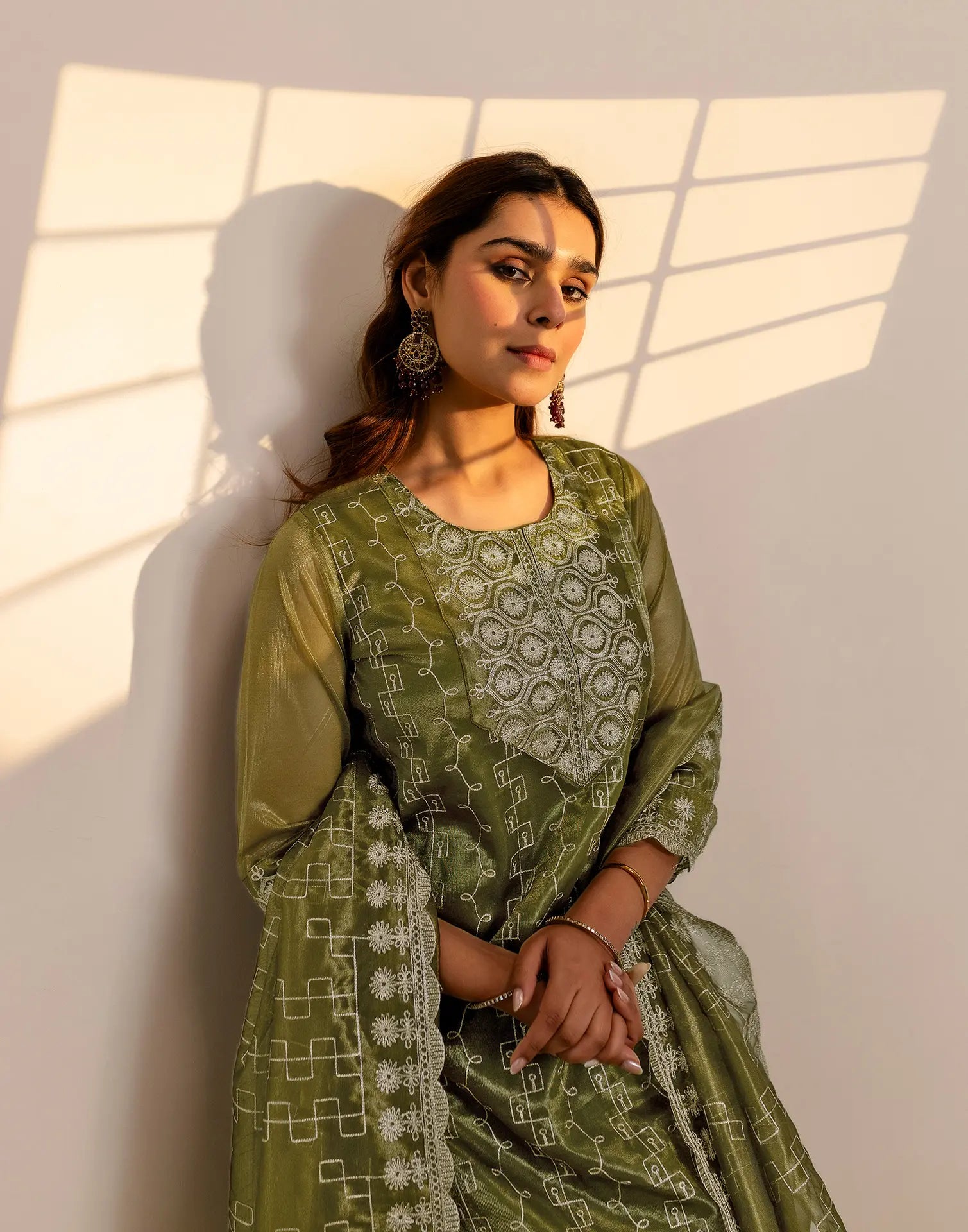 Skylee Net Embroidered Straight 3 Piece Kurta Set For Woman