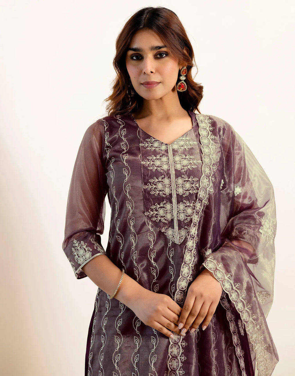 Skylee Net Embroidered Straight 3 Piece Kurta Set For Woman