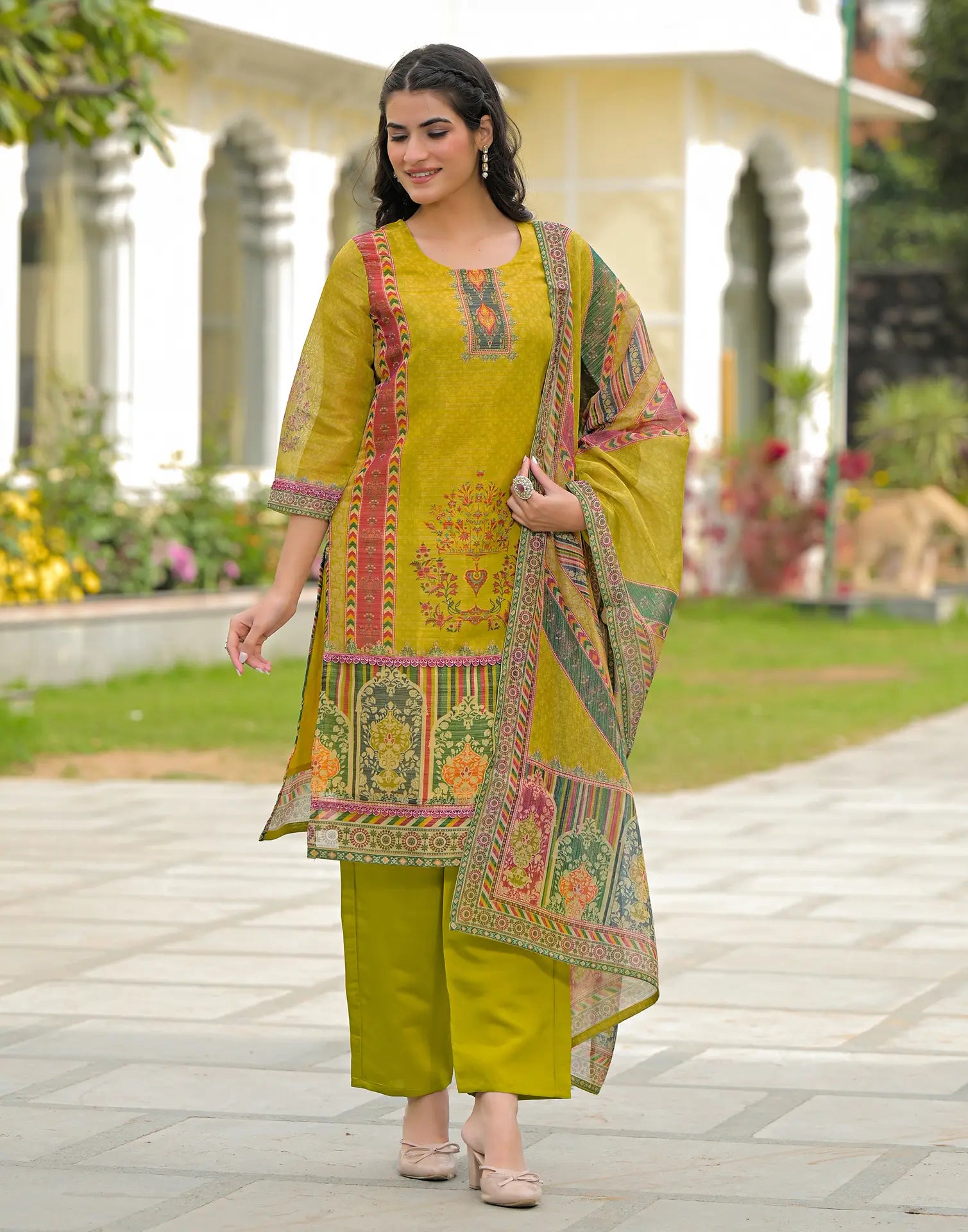 Skylee Net Printed Straight 3 Piece Kurta Set For Woman