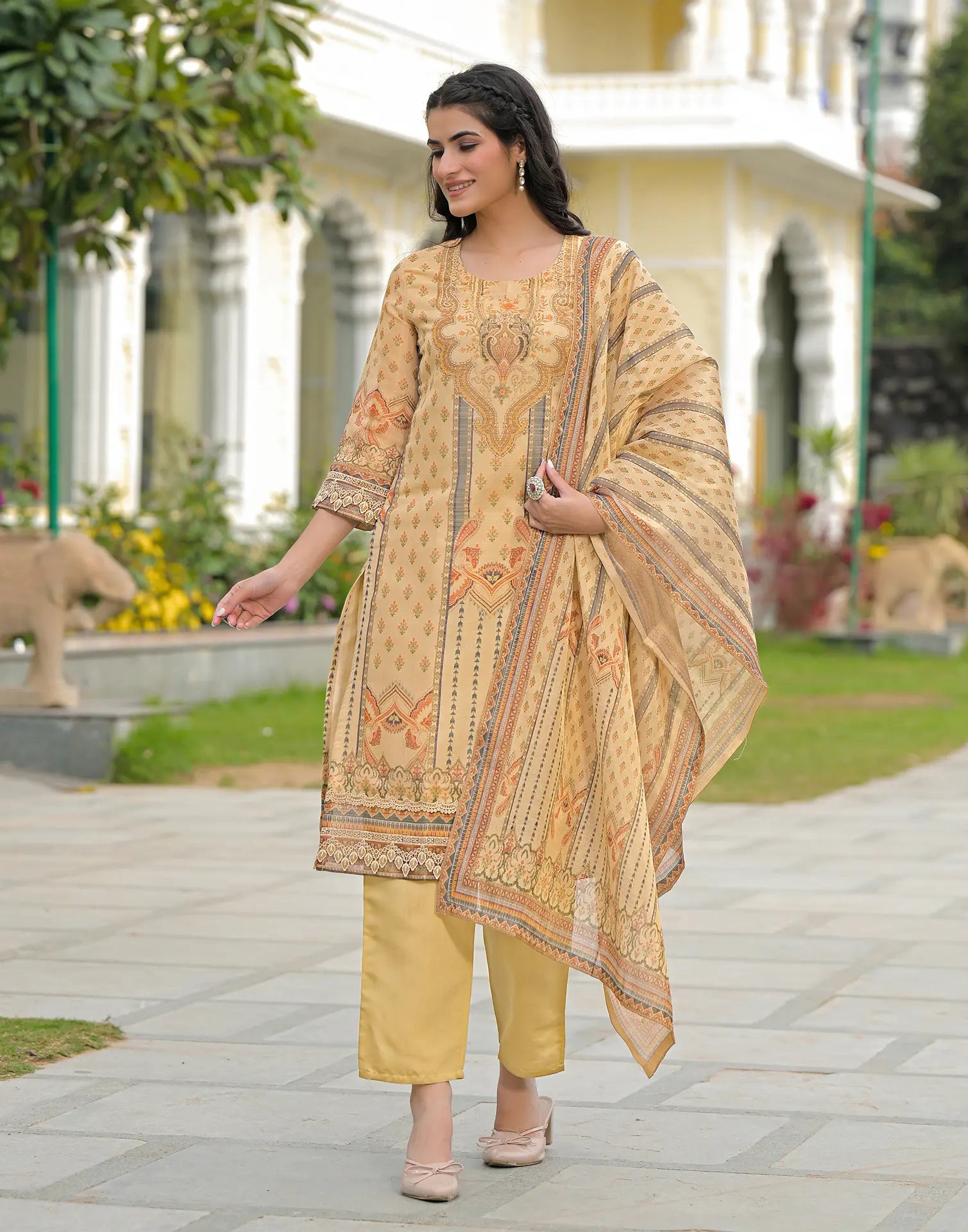 Skylee Net Printed Straight 3 Piece Kurta Set For Woman