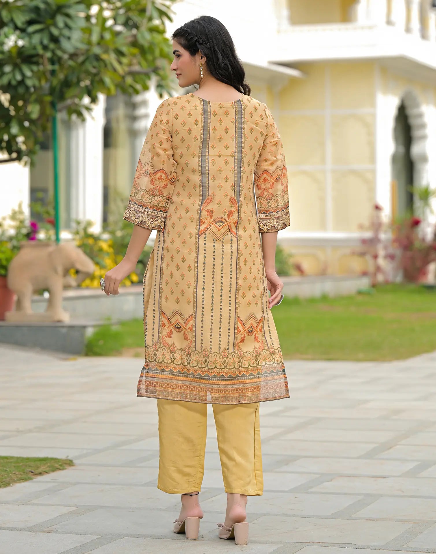 Skylee Net Printed Straight 3 Piece Kurta Set For Woman