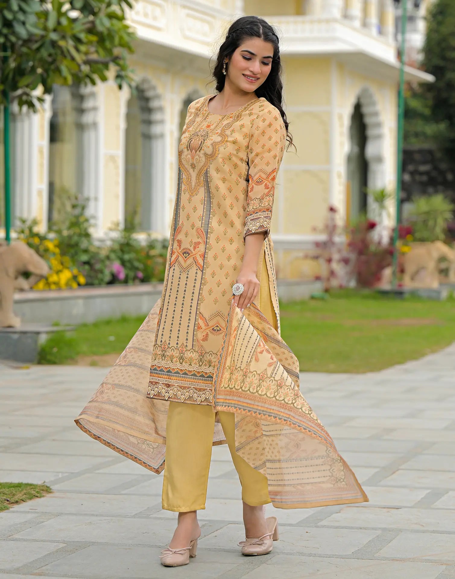 Skylee Net Printed Straight 3 Piece Kurta Set For Woman