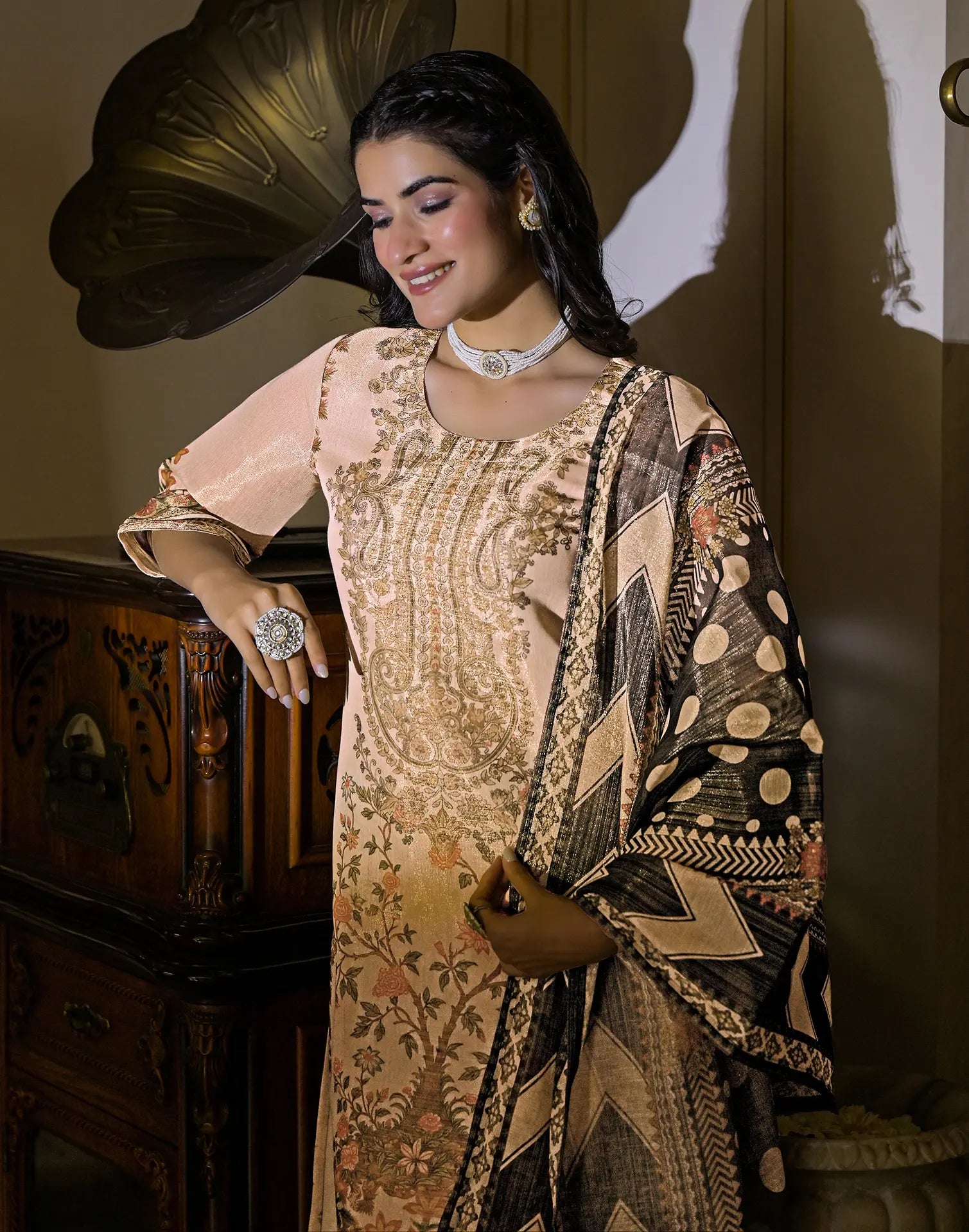 Skylee Net Printed Straight 3 Piece Kurta Set For Woman